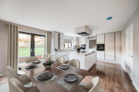 Kitchen (1) with window dressings.jpg