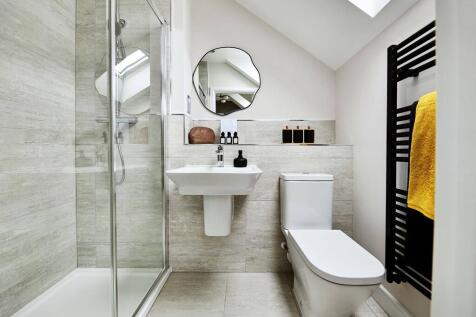 A large double shower serves the ensuite bathroom