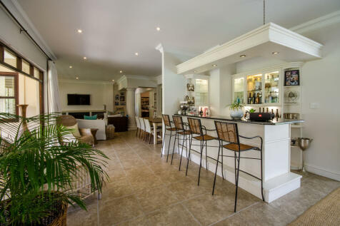 Elegant bar area leading to TV Lounge