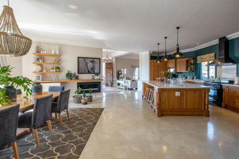 Open plan gorgeous kitchen leading onto formal dining room