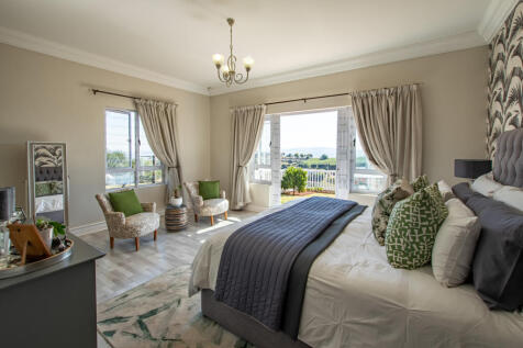 Large spacious en-suite with doors opening out