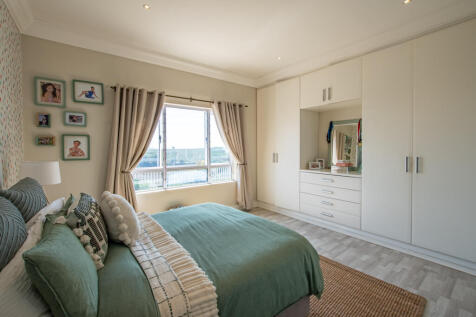 Fourth Bedroom with built in cupboards