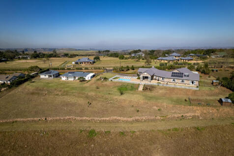 Aerial shot of front arable or grazing land
