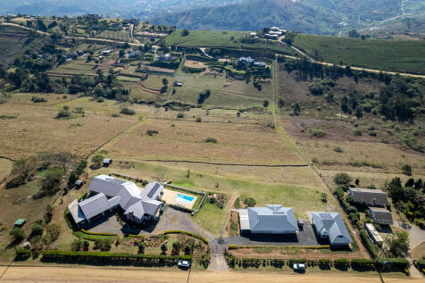 Drone shot of the whole property and across the valley