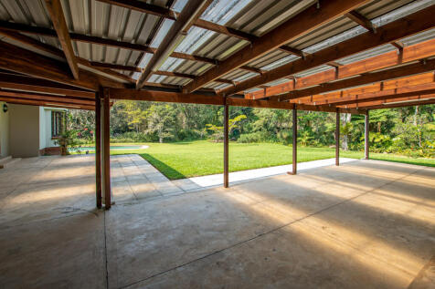 Expansive verandah offering breathtaking views of the garden