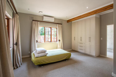 Bedroom 2  with aircon and built in cupboards