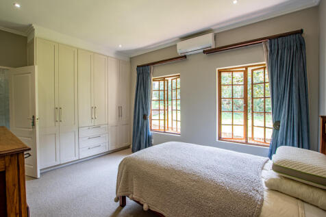 Bedroom 3 with aircon and built in cupboards