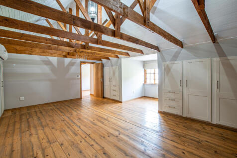 Upstairs extra large bedroom with plenty cupboard space