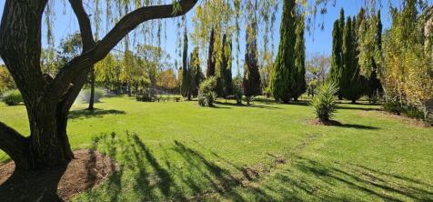 Manicured gardens with automated irrigation