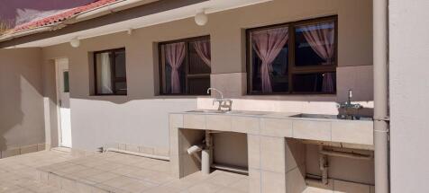 Outside washing area next to kitchen on stoep