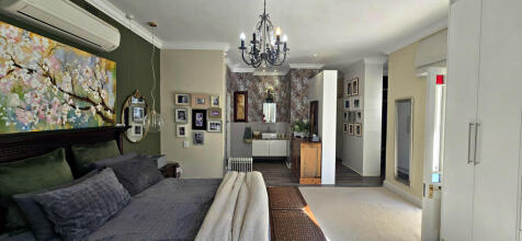 MAIN BEDROOM WITH OPEN PLAN BATHROOM
