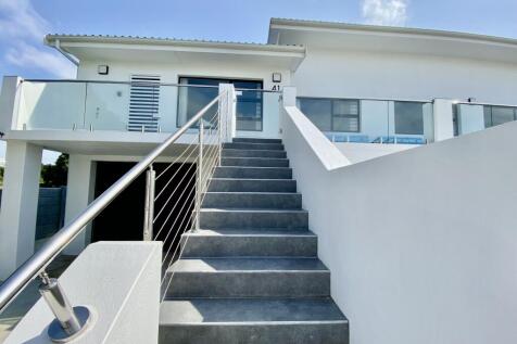 One extra high garage on left