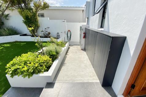 All plumbing pipes tidied in cupboards