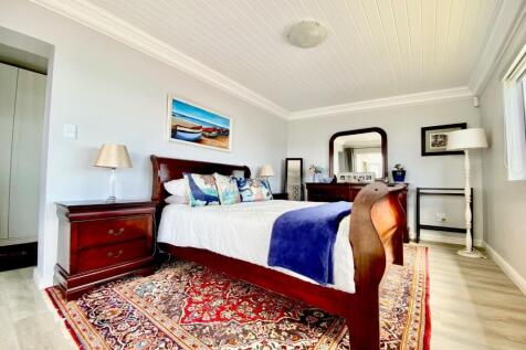 Main bedroom with dressing room and bathroom at back