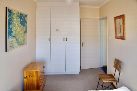 Entrance space with 2 huge linen cupboards before bedrooms