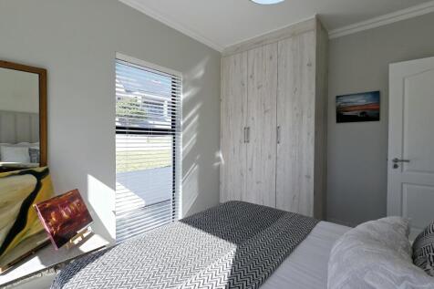BEDROOM 2 BUILT IN CUPBOARDS