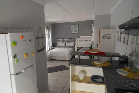 Open plan bedroom/ living area bachelor flat