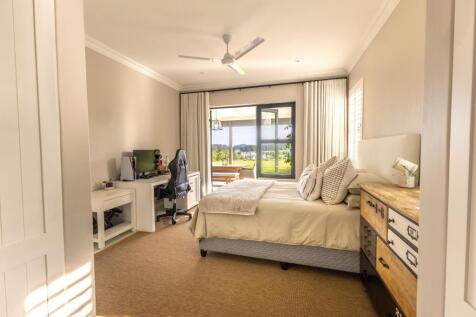 Bedroom opens onto the patio and garden