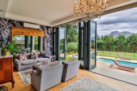 Villa Sunroom overlooking pool and garden