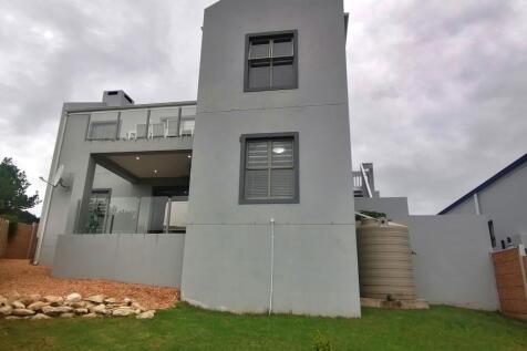 Back yard view of house