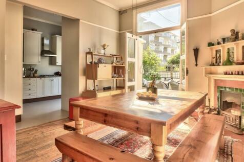 Dining room flows onto deck kitchen and deck 