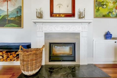Woodburning fireplace in the communal lounge