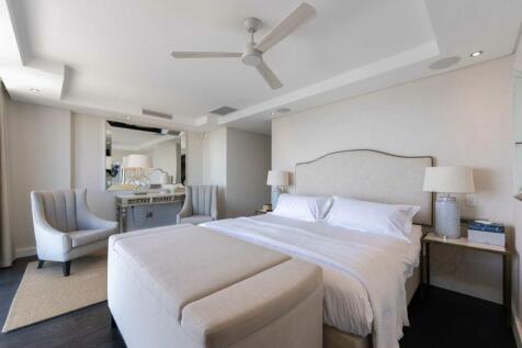 King size main bedroom, includes integrated speakers, electric fan, quality interior finishes.