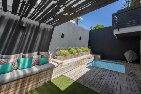 Outdoor seating and heated swimming pool