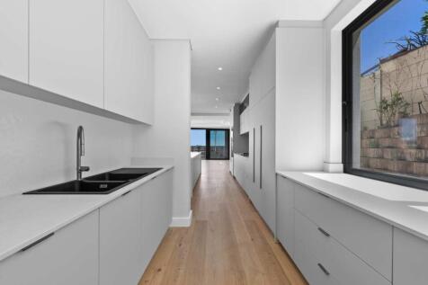 Scullery/laundry  off kitchen