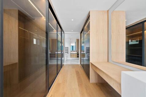 Walk in Cupboards of Main Bedroom
