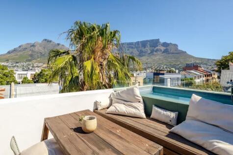 Private rooftop pool terrace with glorious Table Mountain, Lions Head and Devils Peak views