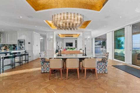 Open Plan - Gold leaf ceiling details, Murano chandelier from Paris&#39; Galerie Glustin.