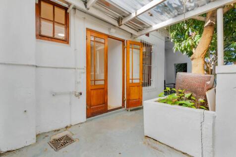 Back area with a herb garden 