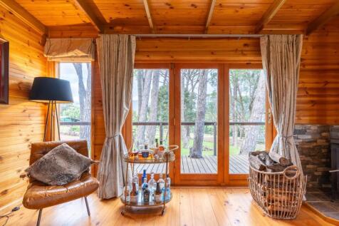 Lounge interior toward rolling gardens 