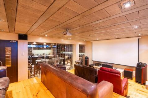 Home Cinema Interior with cellar and tasting room beyond