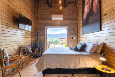 First stable cottage interior toward tennis court