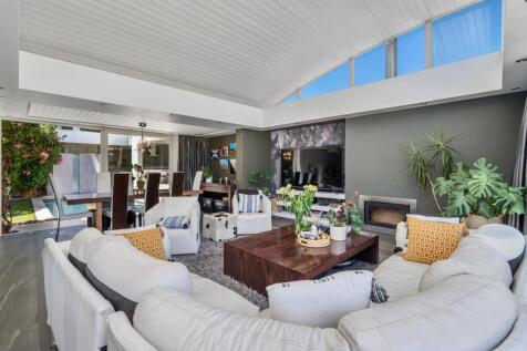 Living space leads onto two outdoor areas