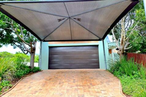 Double garage and 4 carport