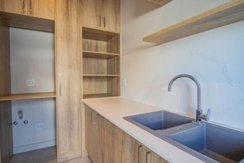 Separate Scullery with ample storage