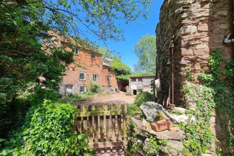 Mill building from garden gate.jpg