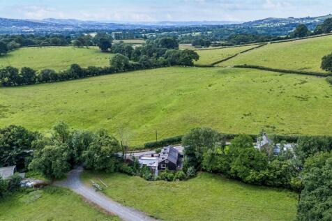 Aerial view of rear of house and location