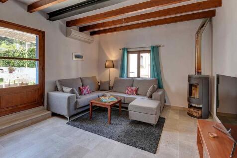 04-s&#39;arraco-Charmantes Stadthaus mit Pool und Weitblick-kaufen-kamin