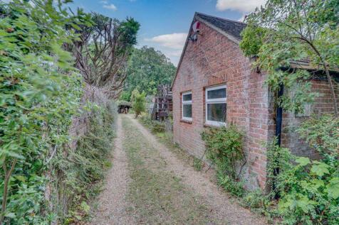 Rear Driveway Leading to Double Garage 