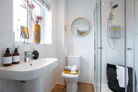 An en suite shower room away from the family