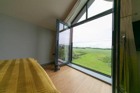 Master bedroom Juliet balcony with op...
