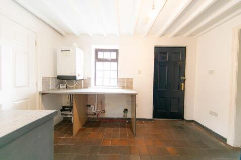 Side porch and utilities room