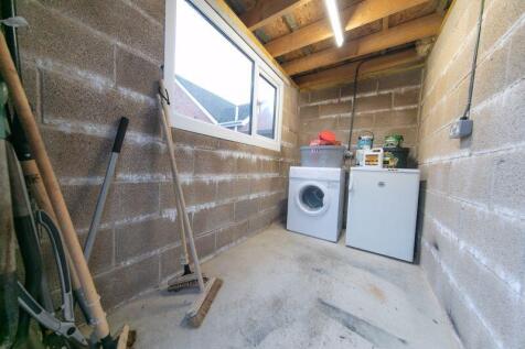 Garage front storage and utilities space