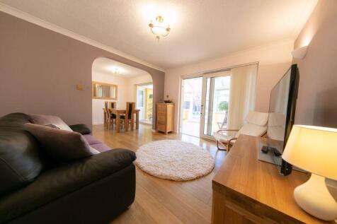 Dining room, rear living space and su...