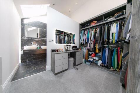 Master bedroom walk in wardrobe