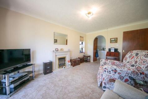 Living room through kitchen